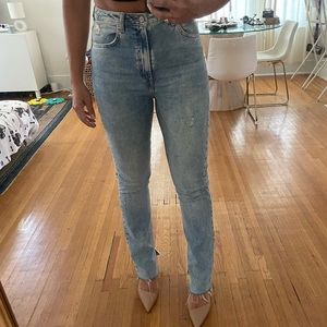 Straight leg denim, open slits by the ankle